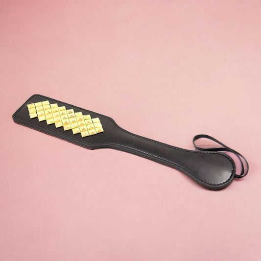 spanking paddle black and gold metal paddle kink fetish kinki couture